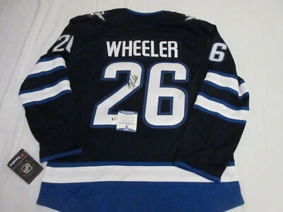CAMISETA DE LOS FANÁTICOS DE LOS WINNIPEG JETS FIRMADA POR BECKETT BAS CERTIFICADO DE AUTENTICIDAD G79537 Foto 1 de 4