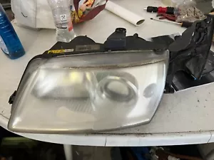 Saab 9-5 YS3E Frontscheinwerfer Links Headlamp 89006251 - 5142138 - Bild 1 von 9