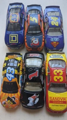 Lot of 6 Nascar die-cast cars. Sandvik, CocaCola, Cheerios, Cooper lighting more - Image 1 of 4