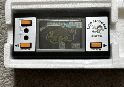 Gioco e orologio LCD Runaway portatile vintage retrò da collezione in scatola originale - Immagine 1 di 4