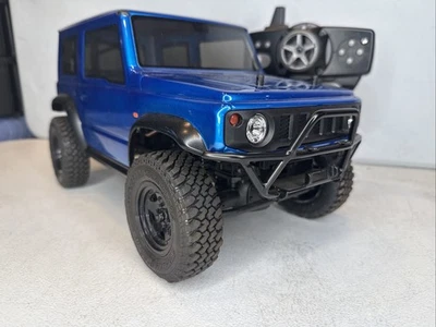 MST CMX Jimny Blue J4 1/10 Scale Crawler RTR W/ RC4WD Hop UPS Rock Crawler - Image 1 of 4