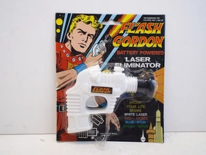 ELIMINATORE LASER VINTAGE FLASH GORDON ALIMENTATO A BATTERIA OTTIMO CARDATO (AM136) - Foto 1 di 3
