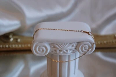 Pulsera minimalista de oro macizo de 14K, pulsera de oro amarillo súper fina y delicada Foto 1 de 4