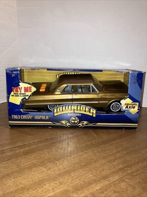 Fun Rise Lowrider Magazine 1963 Chevy Impala Gold Adjustable Axle Collectible - Image 1 of 4