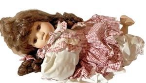 Porcelain Doll - Laying Down -Long  Brown Curly-Hair Blue Eyes-Red Checked Dress - Picture 1 of 6