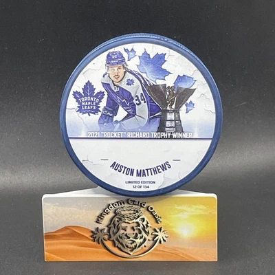 Official Auston Matthews Commemorative Hockey Puck 2021 Limited Edition #d /134 - Image 1 of 2