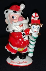VINTAGE KREISS CERAMIC CHRISTMAS FIGURINE - SANTA WITH MONKEY IN STOCKING - Picture 1 of 10