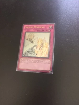 Yu-Gi-Oh: Solemn Warning DREV-EN077  Ultimate Rare Unlimited Edition High Grade - Image 1 of 4