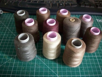 11 SMALL CONES OF SEWING THREAD USED - Image 1 of 4