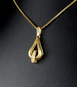 Ciondolo moderno CHRIST in oro 750 e diamanti 0,03 ct oro giallo 18 ct - Foto 1 di 7