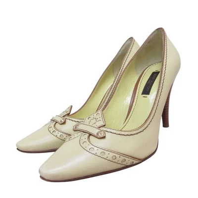 Zapatos de salón de cuero con punta de ala medallón LOUIS VUITTON 35M amarillos para mujer USADOS Foto 1 de 4