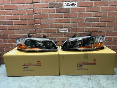 03-06 Juego de faros HID (negro mate) Mitsubishi OEM Evo 8 JDM MR) Foto 1 de 4