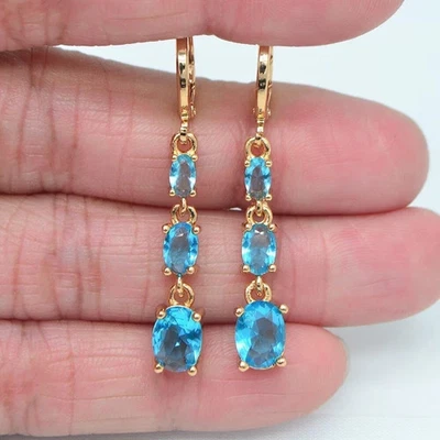 Lab Created Blue Topaz 2.50Ct Oval Cut Dangle Earrings 14k Yellow Gold Plated - Image 1 of 4