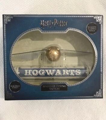 HARRY POTTER MYSTERY FLYING SNITCH WITH REALISTIC FLAPPING WINGS COLLECTABLE  - image 1 of 4