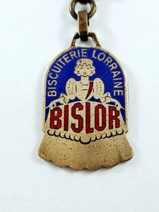 SCHLÜSSELANHÄNGER - Augis - BISLOR - BISCUITERIE LORRAINE - 1950er Jahre Metall EMAILLIERT - - Bild 1 von 3
