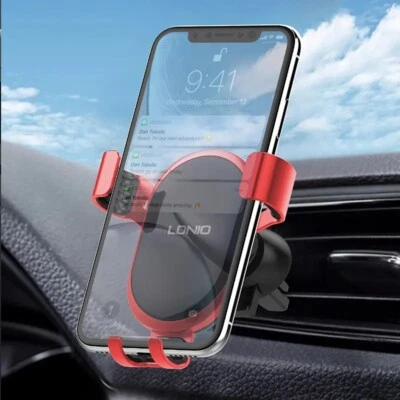 Handyhalterung Autohalterung Gravity  Kfz Halterung Auto Lüftungsgitter Halter 2 - Bild 1 von 4