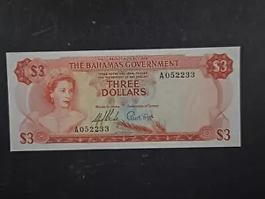 Bahamas c. 1965 $13 - Pick# 19a - S/N A052233 - sólido AU - Imagen 1 de 6