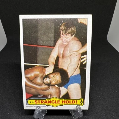 1985 Topps WWF Strangle Hold! Roddy Piper Junkyard Dog - Image 1 of 2