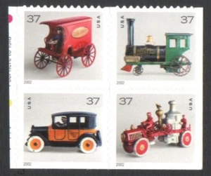 Unused US Postage Block of 37 Cent Stamps ANTIQUE TOYS Mail Truck Fire Engine Tr - Picture 1 of 2
