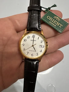 ORIENT LUN63004W0 OROLOGIO VINTAGE UOMO PELLE NERO DATA DORATO 35mm SOTTOCOSTO - Zdjęcie 1 z 9