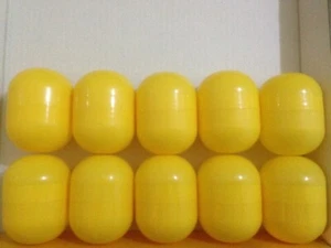 10 leere Mini Maxi Ü-Ei Kapseln Hüllen gelb - basteln, Tombola, Hochzeit - Bild 1 von 1