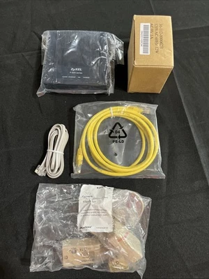 ZyXEL P-660RU-T1 v2 BLACK MODEM, P-600 SERIES, 9V AC, 1A, 8 WATT MAX  - Image 1 of 4