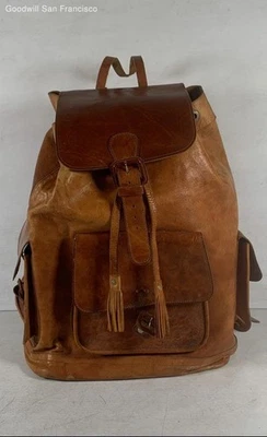 Mochila de viaje ligera de cuero marrón con correa ajustable para el hombro Foto 1 de 4