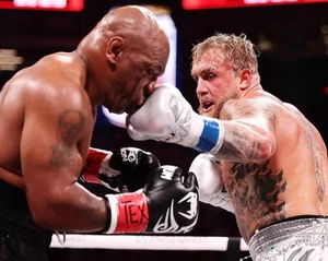 Jake Paul Hits Mike Tyson 2024 Boxing Matchup 8x10 Color Photograph - Picture 1 of 1