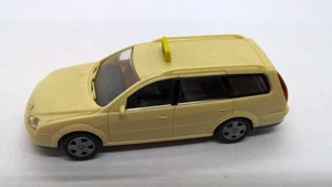 Rietze 31130 Ford Mondeo Torneo Ghia beige TAXI con placa de techo (35) - Imagen 1 de 3