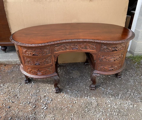 CARVED MAHOGANY KIDNEY SHAPED DESK, ATTR. R. J. HORNER Cover