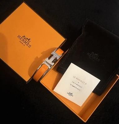 Bracelet Hermès Clic H- Orange/argenté- Très bon État - Taille S Authentic - Photo 1/2