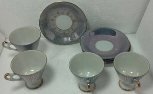 Juego de 4 tazas y platillos sin marca usado en muy buen estado azul/dorado - Imagen 1 de 9