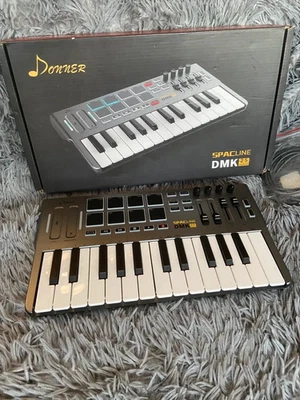 Donner DMK25 25-Key USB MIDI Keyboard Controller mit Drum Pads Studio Portable - Bild 1 von 4