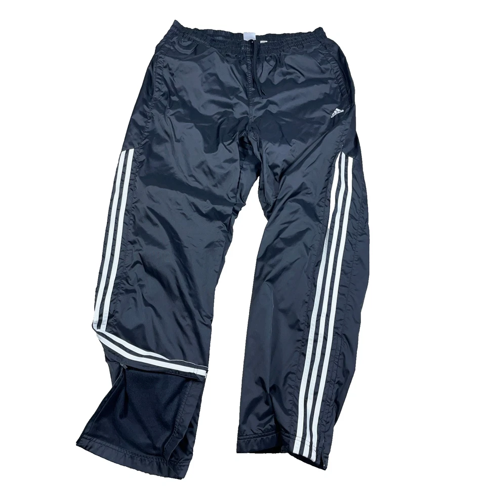 Calça Adidas Masculina Média Preta Branca Quebra-Vento Joggers Track Baggy Forrada Adulto - Imagem 1 de 4