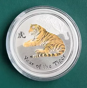 2010 AUSTRALIA COIN YEAR OF TIGER 1 oz 0.999 PURE SILVER COLORIZED in cap - Bild 1 von 2