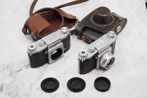 PRAKTIFLEX FX 35 mm TWO cameras One Works - One Parts, 50mm lens, Cases - Picture 1 of 16