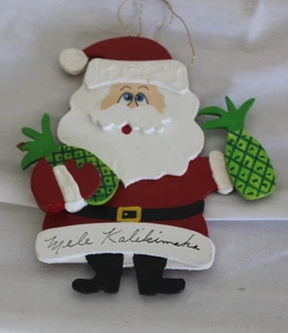 Mele Kalikimaka Santa Wood Christmas Ornament with Pineapple - Picture 1 of 2