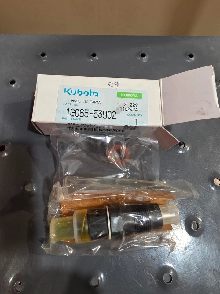 Inyector de combustible Kubota original OEM 1G065-53900 1G065-53902 Foto 1 de 1