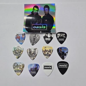 OASIS LIAM & NOEL GALLAGHER PLECTRUMS 0.7G DBL SIDED x12 PICKS+ HOLOGRAM STICKER - Picture 1 of 10