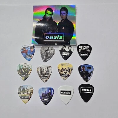 OASIS LIAM & NOEL GALLAGHER PLECTRUMS 0.7G DBL SIDED x12 PICKS+ HOLOGRAM STICKER