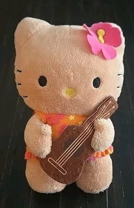 Sanrio sonnengeküsstes Hello Kitty hellbraun 7 Zoll Plüsch mit Ukulele & Blume Guam Saipan 2013 - Bild 1 von 8