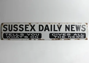 SUSSEX DAILY NEWS ENAMEL SIGN 'TELLS YOU WHAT'S ON' PAPER RAN FROM 1870 - 1956 - Picture 1 of 2