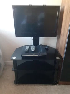 TV, And Remotes And Stand - Picture 1 of 19