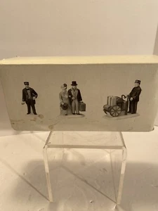 Juego de 3 estatuillas Department 56 Heritage Village Holiday Travelers 5571-9 - Imagen 1 de 7