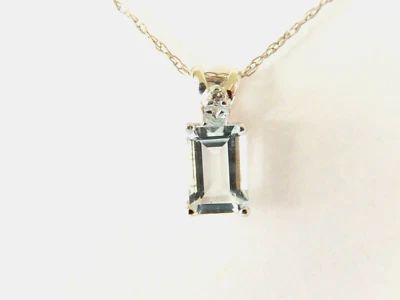 10k White Gold Diamond and .75CT Aquamarine Emerald Shaped Pendant w/17" Chain - Image 1 of 4