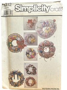 SIMPLICITY PATTERN - 8412 DECORATIVE GIFT WREATHS DOG CAT KITCHEN BABY UNCUT - Picture 1 of 2