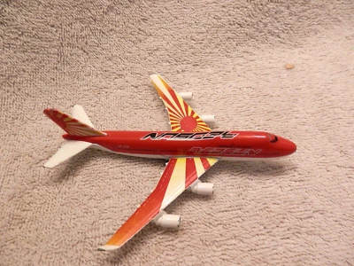 Majorette Boeing 747 Red Sun Diecast Airplane - Image 1 of 3