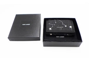 Cartera triple plegable SAINT LAURENT PARIS 556429 Constellation Star negra auténtica - Imagen 1 de 6