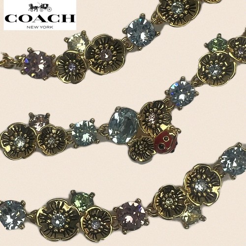 Collana coccinella Coach tono oro cristallo Swarovski rosa tè prolunga 16" + 2"