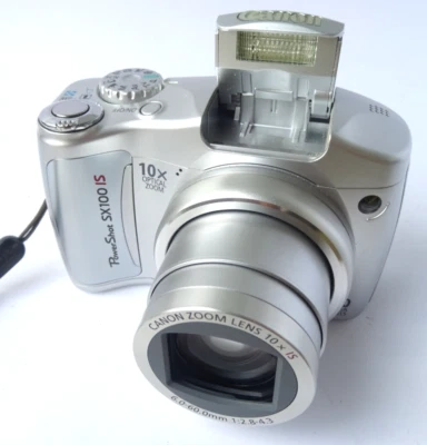 CANON PowerShot SX100 IS 8.0MP 10X Zoom Digital Camera w/ 4GB SD Card | WORKS - Image 1 of 4